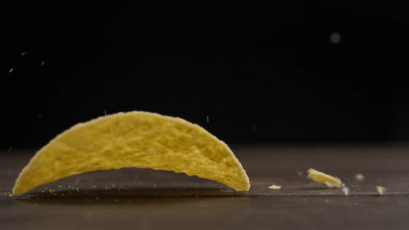 Chips falling onto a wooden surface