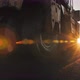 A Grunge Road Roller Levels the Asphalt in the Setting Sun. Road Surface Repair. Construction of a - VideoHive Item for Sale