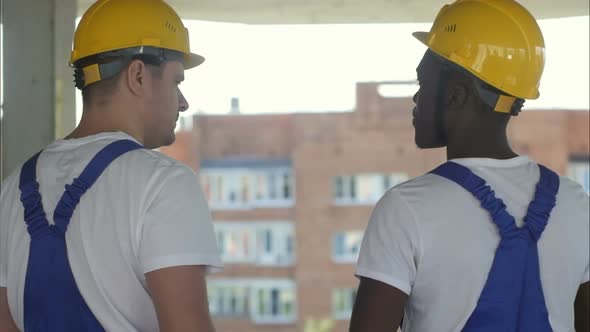 View of a Workers Watching Some Details on a Construction