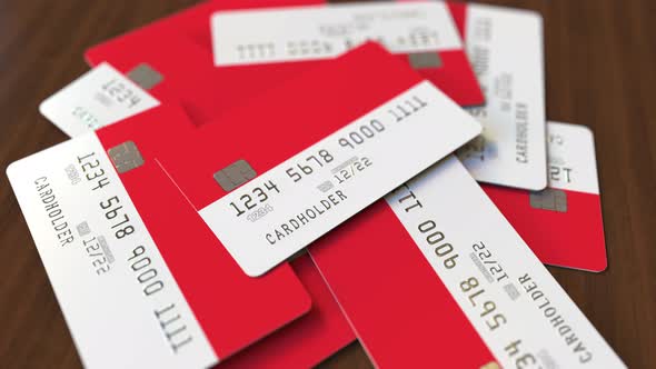 Pile of Credit Cards with Flag of Indonesia alt