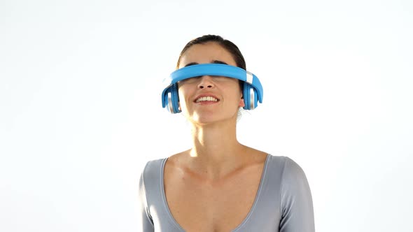 Woman pretending to use visual reality headset