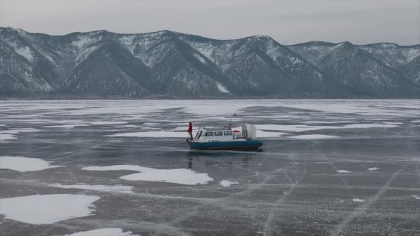 Khivus on a Hovercraft Rides on the Frozen Lake Baikal a Trip to Russia