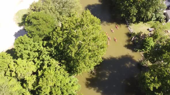 Aerial view of kayakers going down Huron River in Southeast Michigan - drone shot