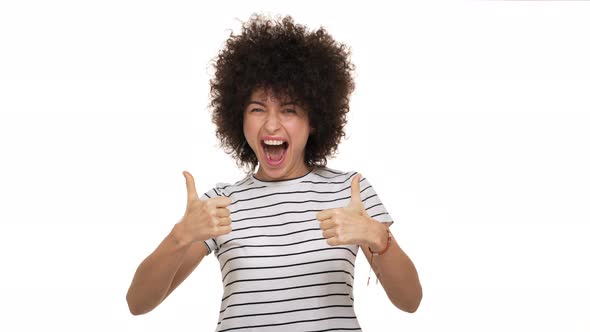 Portrait of Extraordinary Curly Woman Appearing From Bottom in Front of Camera Laughing Out Loud