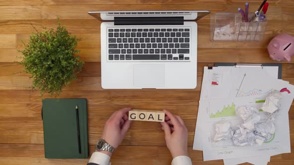 Word Goal is Made of Wooden Cubes on the Office Table