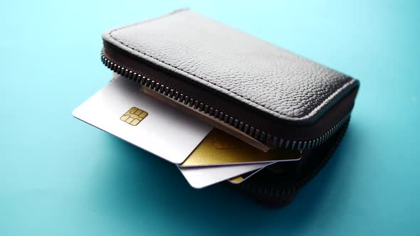 Close Up of Credit Cards in a Wallet on Wooden Background