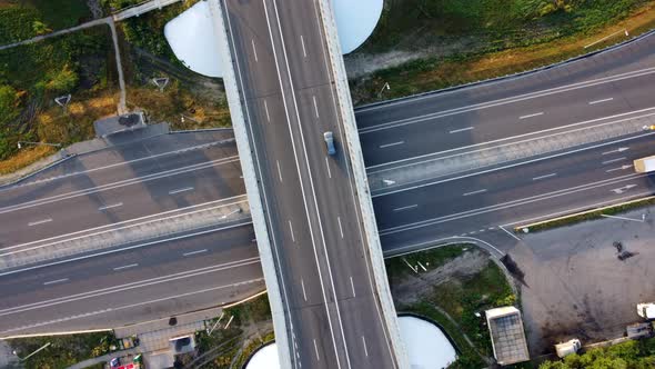 Aerial Drone View Flight Over Road Bridge Car Junction with Driving Cars Trucks