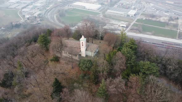 aerial footage of an ancient church on top of a mountain in 4k Swizterland