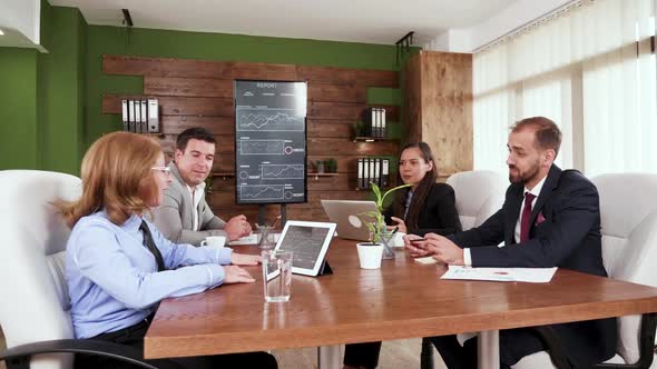 Team of Business People Having a Meeting in the Conference Room