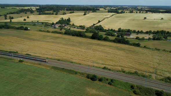 High Level View of a Fast Commuter Train in the Countryside