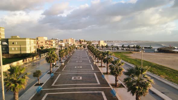 Aerial View of Mazara Del Vallo City Promenade Along the Ocean Beautiful Coast of Sicily at Sunset