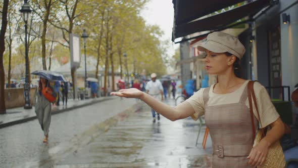 Young tourist in the rain