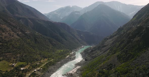 Aerial View Over River Running Through Swat Valley Floor