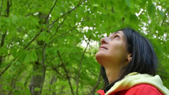 Thoughtful Woman Enjoy Spring Greenery (Dlog)