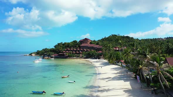 Aerial view panorama of tropical island beach journey by clear water and white sandy background of a