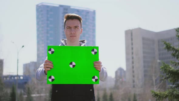 Guy Holds a Picket for Poor and Terminally Ill. People Fight for Social Justice