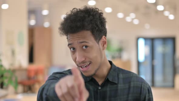 African American Man Pointing at Camera