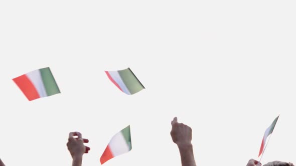 Hands Waving with Italian Flags Outdoors