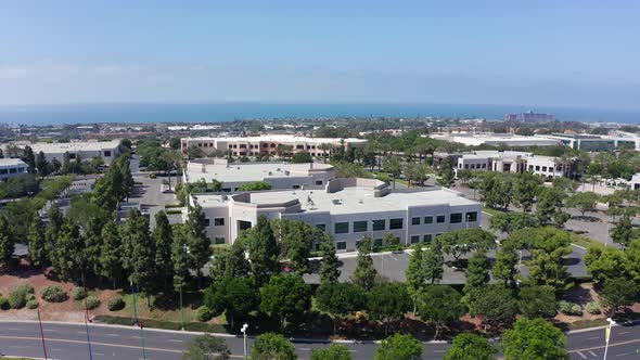 Aerial shot flying over a business park in the city of Carlsbad, California