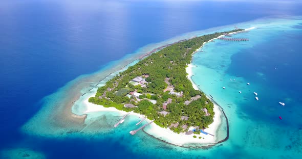 Daytime drone island view of a white sand paradise beach and turquoise sea background in best qualit