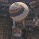 Hot Air Balloon with Designed Envelope Flies Over Buildings - VideoHive Item for Sale