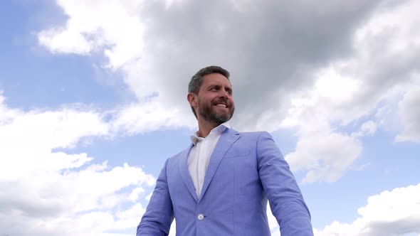 Happy Bearded Man in Jacket with Wristwatch on Sky Background Male Fashion