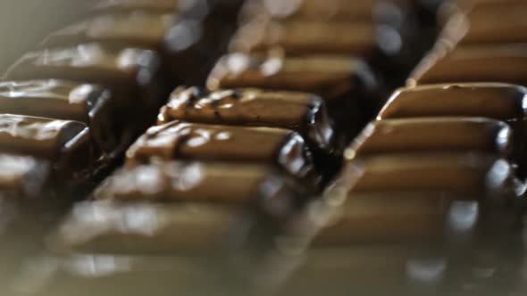 Alignment of the Chocolate Surface of Sweets in the Production of Confectionery