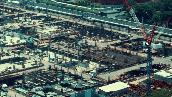 Large Construction Site with Heavy Construction Machinery in Metropolis