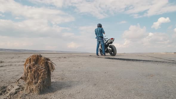 Motorcyclist Doing Tire Burnout in the Desert Slow Motion