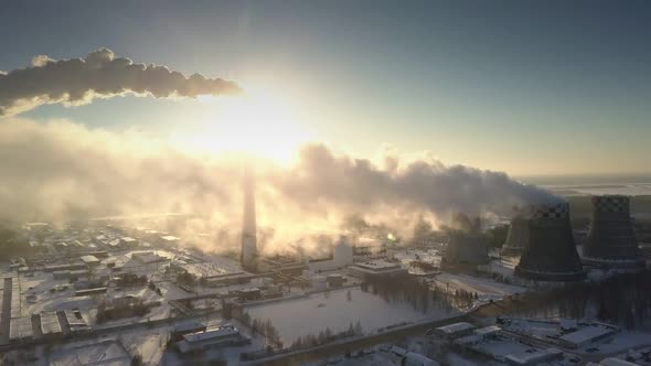 Bird Eye View Large Smoke and Steam Clouds Blown in Winter