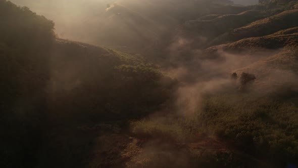 4K Aerial view of Mountains landscape with morning fog.