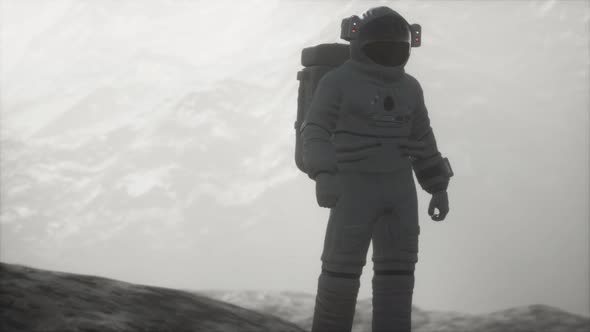 Astronaut on Another Planet with Dust and Fog alt