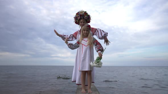 Wide Shot Portrait of Confident Happy Ukrainian Daughter and Mother in Traditional Embroidered