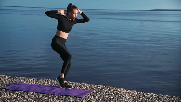 Active Fitness Girl Practicing Morning Cardio Training on Beach