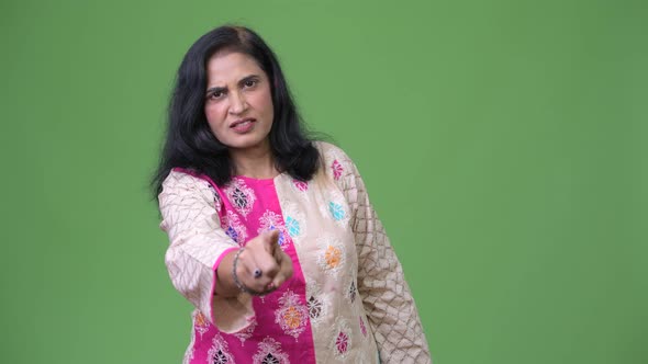 Mature Beautiful Indian Woman Pointing To Camera