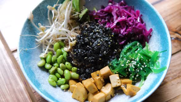 Tasty Vegan Poke Bowl with Vegetables and Quinoa