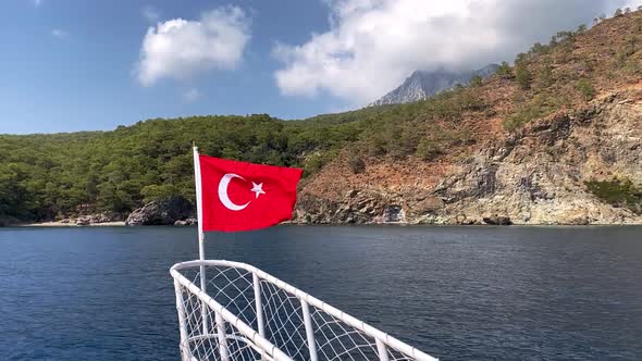 The Turkish Flag Flying Over the Sea