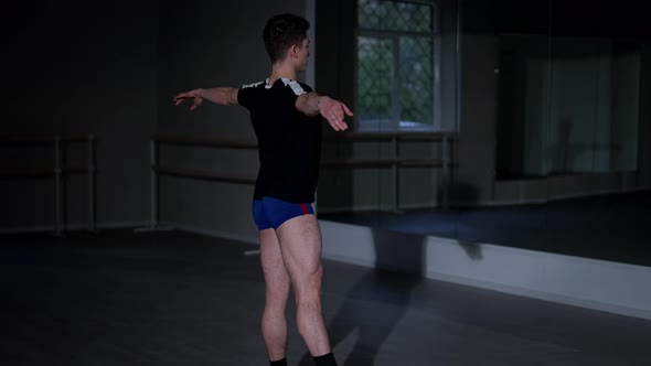 Confident Talented Male Ballet Dancer Spinning Jumping Sitting Down Raising Hands