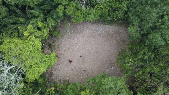 Aerial look down children play football 