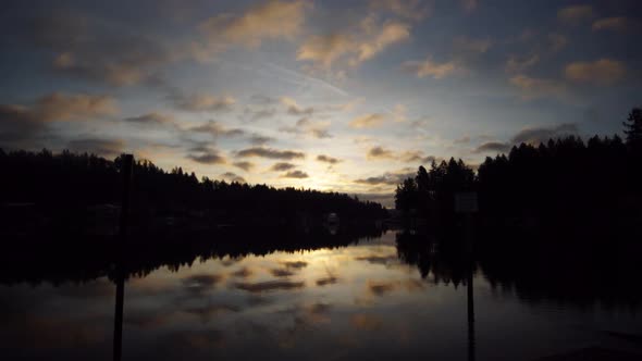 Hyper time lapse left to right of sunrise over Wollochet Bay near Gig Harbor, Washington, streaming