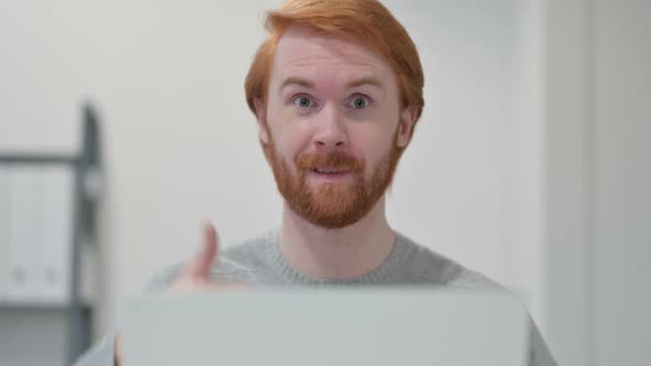 Thumbs Up By Beard Redhead Man with Laptop