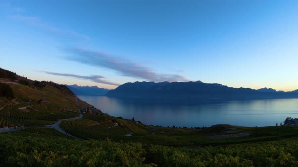 Autumn sunset timelapse Lavaux vineyard, Lake Léman and the Alps in the background - Switzerland