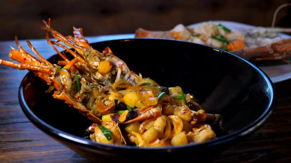 Fresh Lobster Roasted with Vegetables and Cashew Nuts in Luxury Restaurant