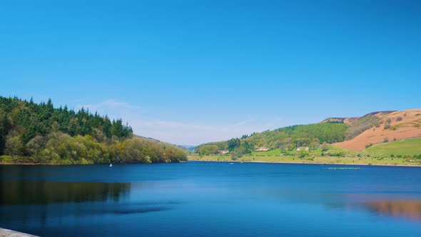 Lady bower reservoir beautiful scenery forest in the background on the left and mountains on the rig