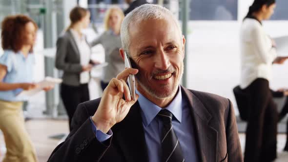 Businessman talking on mobile phone