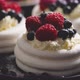 Delicious Mini Pavlova Meringue Desserts Served with Frozen Frosty Berries - VideoHive Item for Sale