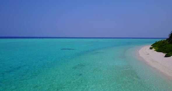 Wide angle above abstract view of a summer white paradise sand beach and blue ocean background in co