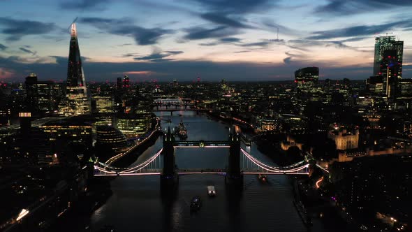 Aerial View of London over the River Thames including Tower Bridge, Shard and the Tower of London at