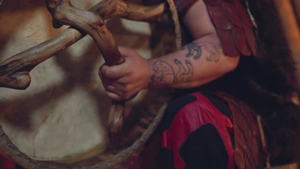 Man Supports Shamanic Traditions and Plays Ritual Drum