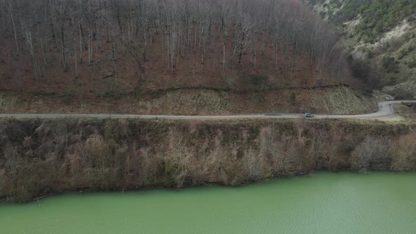 Car On Road Near Dam